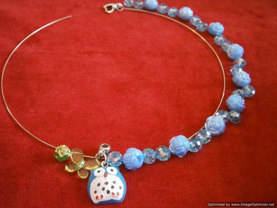 asymmetrical blue and green owl necklace