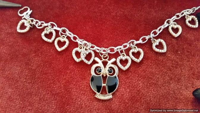 Black owl and rhinestone hearts charm bracelet