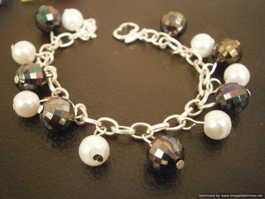 beautiful black and white disco ball charm bracelet made during our jewellery making party
