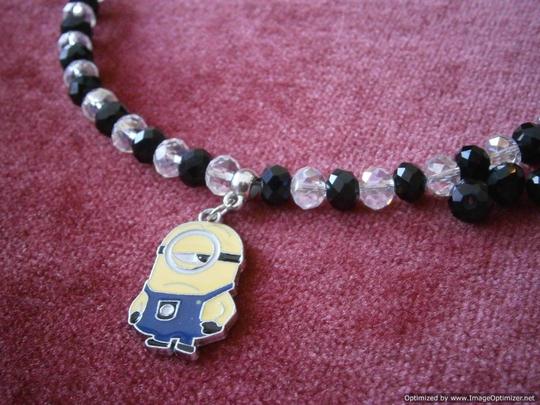 minion necklace made during a creative jewellery making party for 7 year old girls